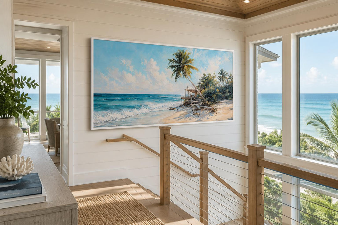 Coastal wall art of a tropical beach with palm trees and turquoise waves in a bright hallway.