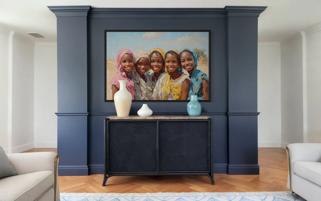 Smiling African Girls In Traditional Clothes Framed Canvas Wall Art above a dresser