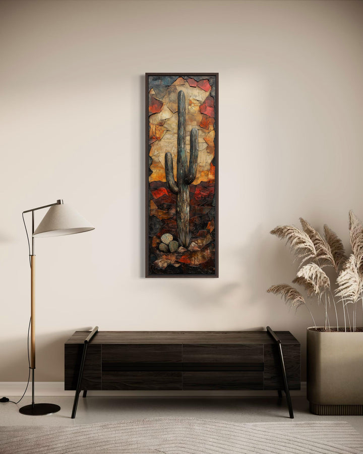 Vertical tall narrow saguaro cactus wall art in a textured, mosaic-style desert landscape.
