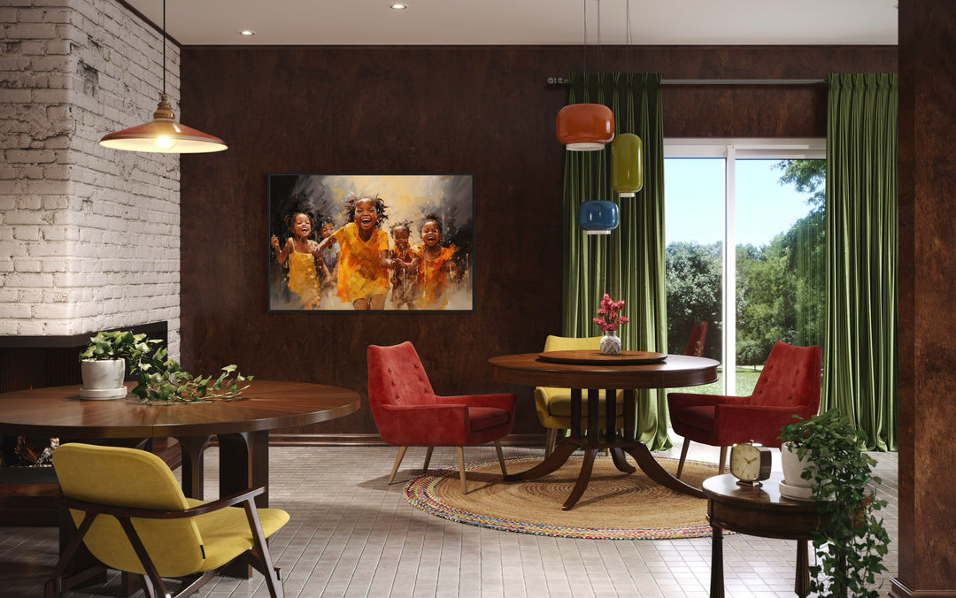 Happy African Kids Playing Framed Canvas Wall Art in a room with a table, chairs