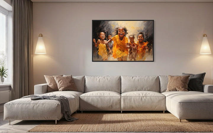 Happy African Kids Playing Framed Canvas Wall Art in a living room with a couch