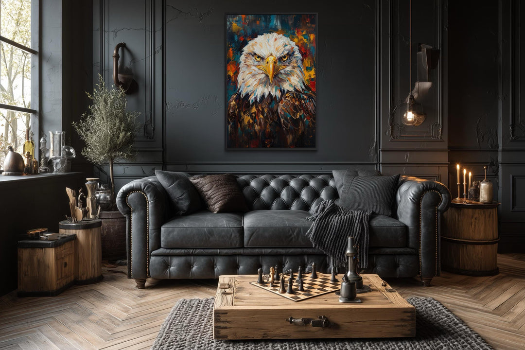 Bald eagle canvas wall art in a dark office with a black leather sofa and wooden coffee table.