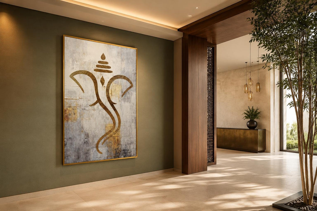 Minimalist Lord Ganesha canvas wall art with metallic gold line work on a textured neutral backdrop.