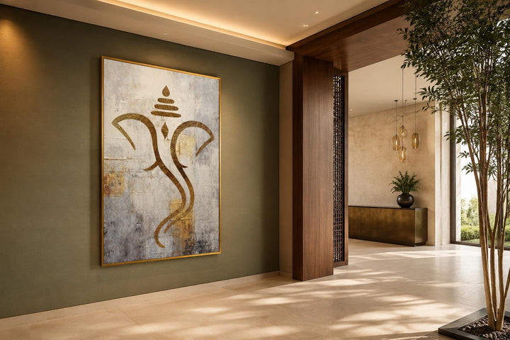 Minimalist Lord Ganesha canvas wall art with metallic gold line work on a textured neutral backdrop.