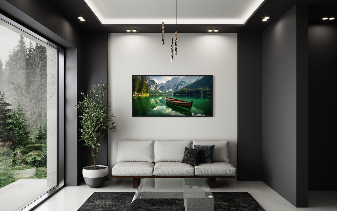 a living room with a couch and a Wooden Canoe In Emerald Green Lake Wall Art "Mountain Lake Solitude"