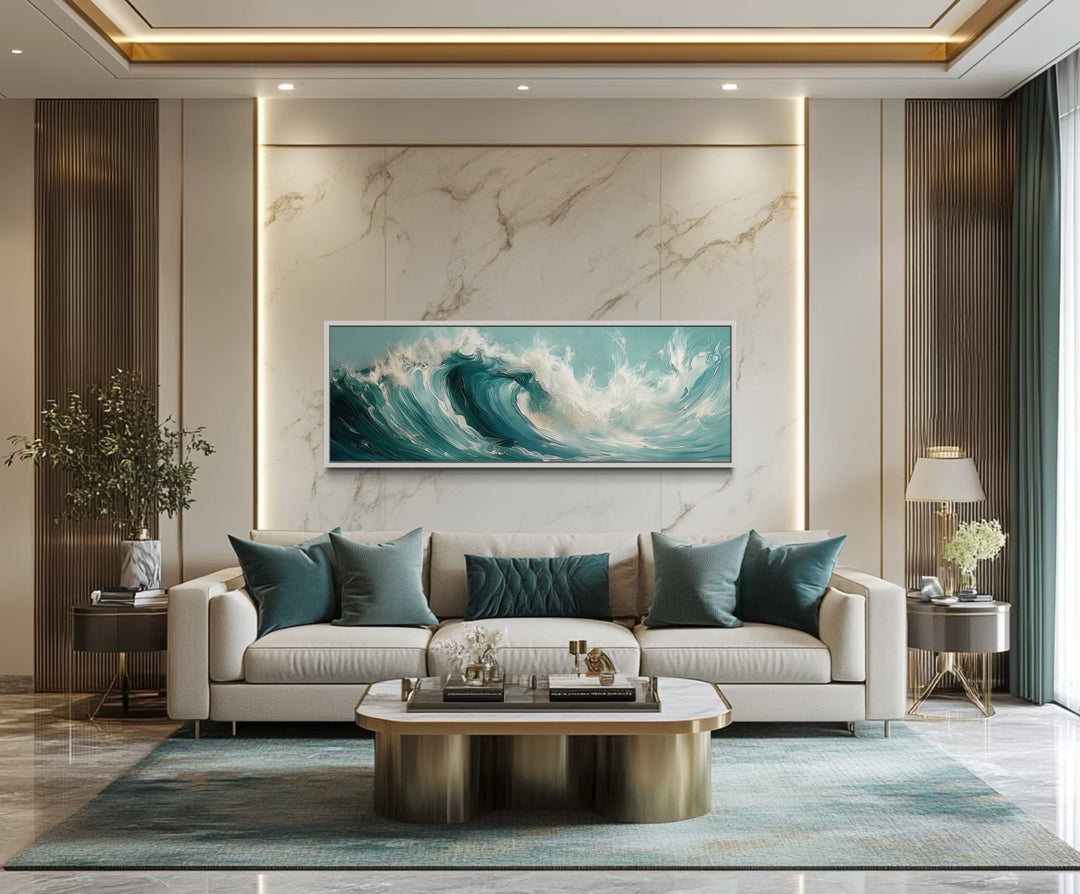 Teal Ocean Wave Coastal Horizontal Framed Canvas Wall Art in a living room filled with furniture and a painting on the wall