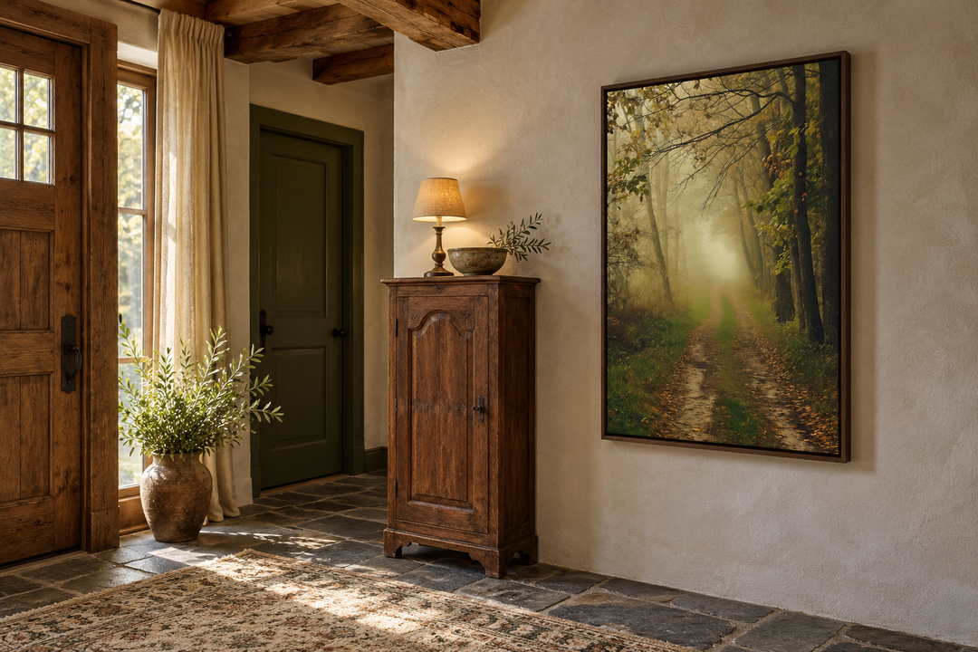 Moody foggy autumn forest framed canvas wall art hanging in a rustic entryway.