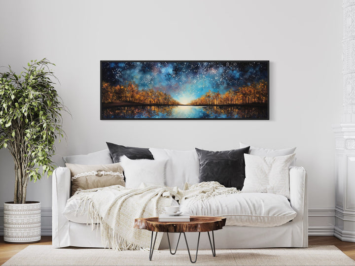 Starry Sky Over Autumn Forest And Lake Painting Framed Canvas Wall Art above white couch