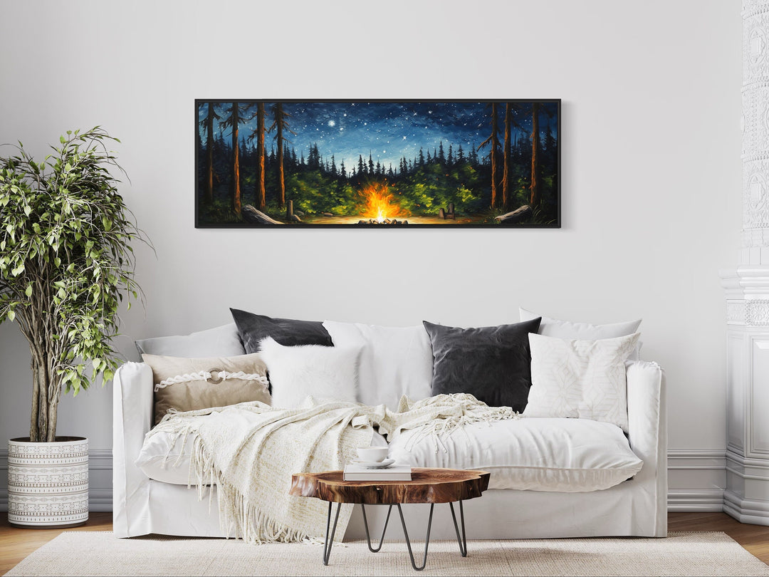 Campfire in The Forest Cozy Cabin Above Mantel Wall Art above white couch