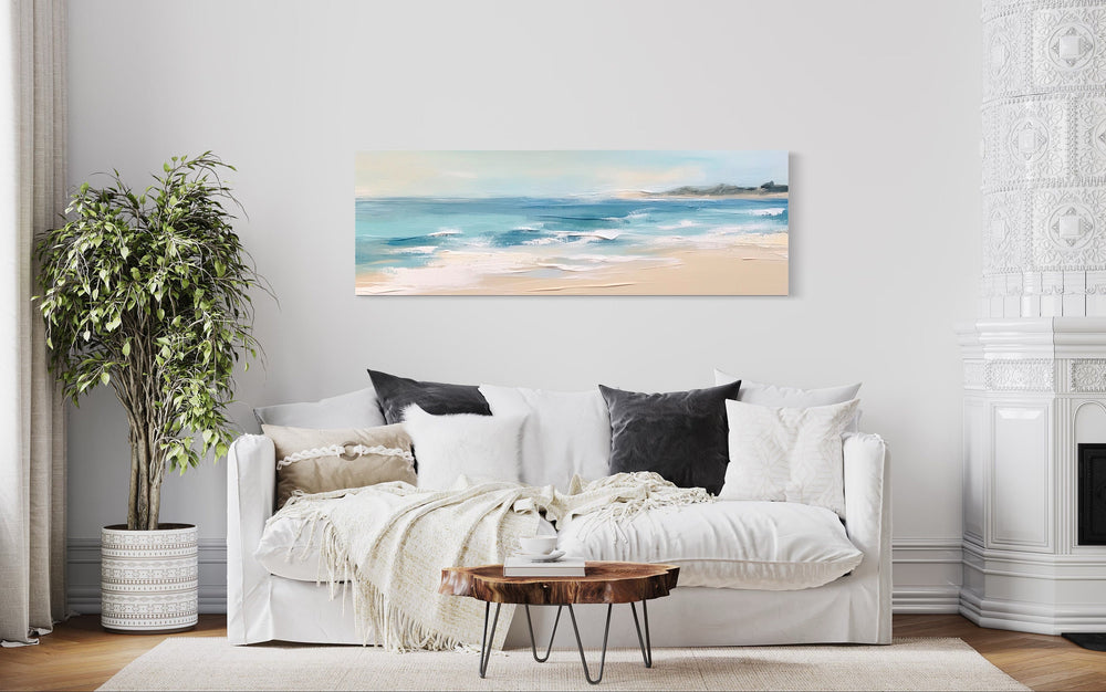 Calm Ocean Beach Panoramic Coastal Framed Canvas Wall Art above white couch