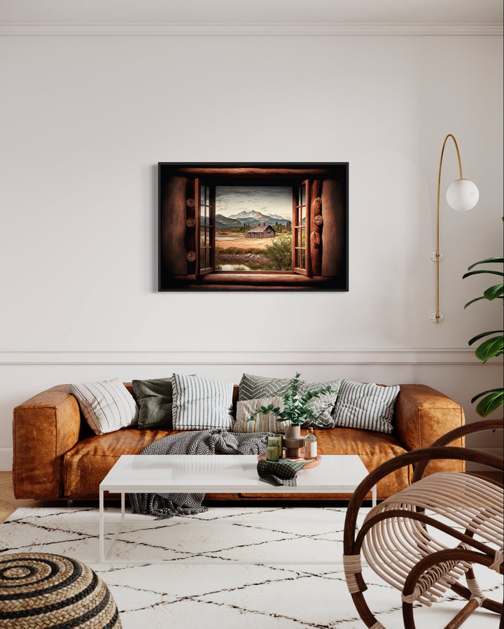 Mountain Cabin Seen Through Open Window Canvas Wall Art above couch