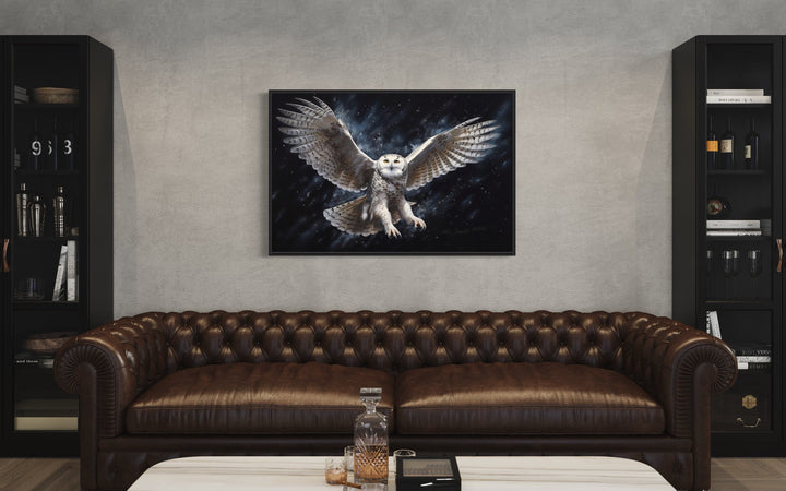 Snowy Owl Flying At Night Framed Canvas Wall Art in living room