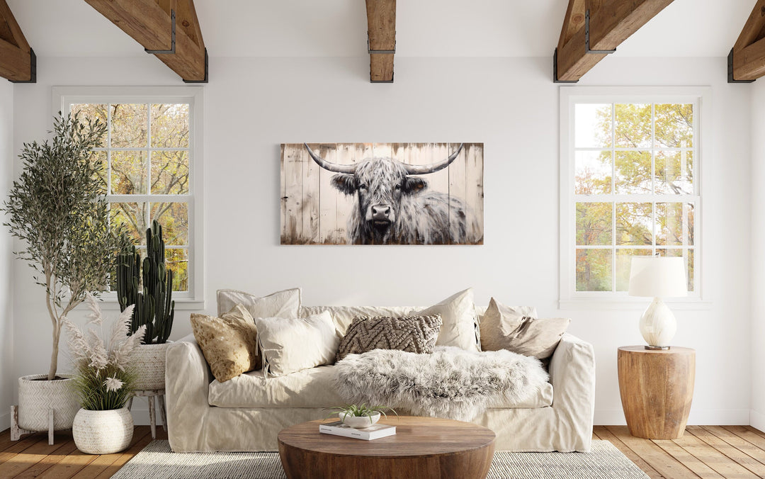 Highland Cow Painting Farmhouse Wall Art above beige couch