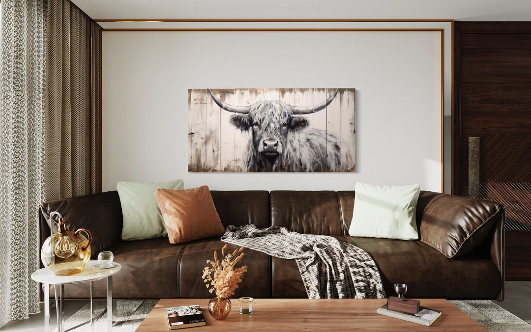 Highland Cow Painting Farmhouse Wall Art above brown couch