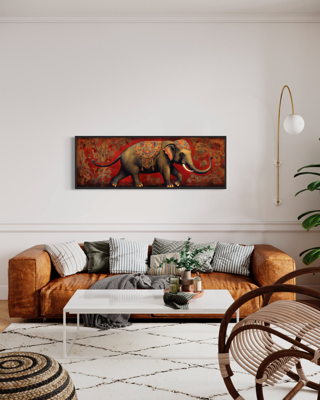 Indian Elephant Traditional Panoramic Wall Art "Majestic Elephant Parade" over brown couch
