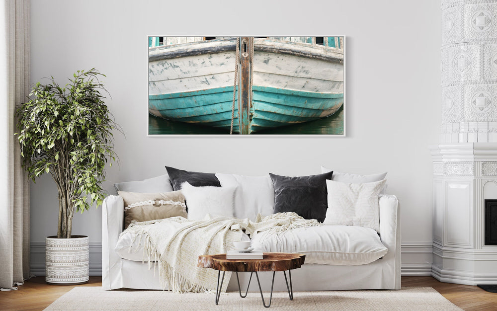 Rustic Old Teal Boat Close Up Framed Canvas Wall Art above white couch