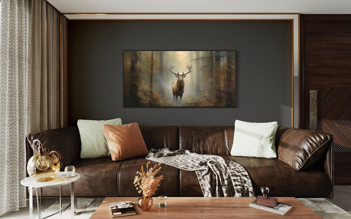 Elk in Foggy Green Forest Extra Large Wall Art above brown couch