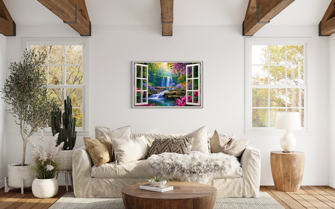 Vibrant Garden And Waterfall Fake Window Wall Art above beige couch