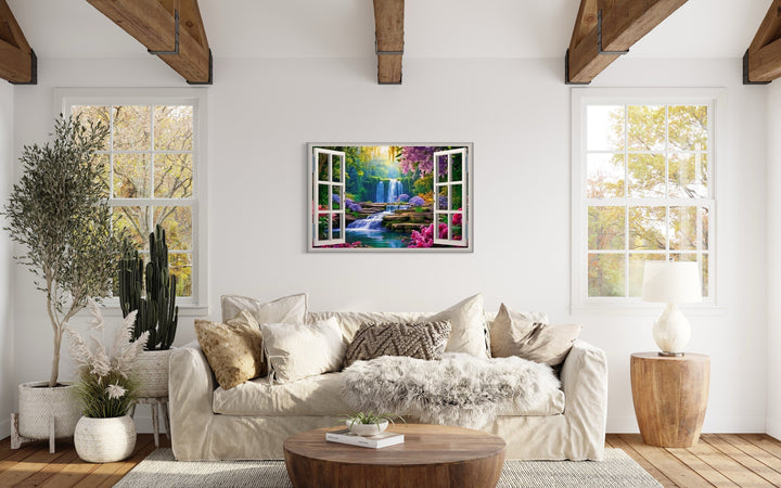 Vibrant Garden And Waterfall Fake Window Wall Art above beige couch