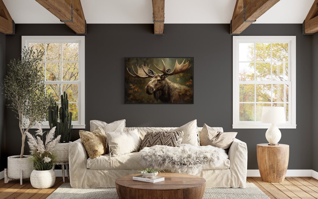 Moose With Antlers In The Forest Wall Art over beige couch