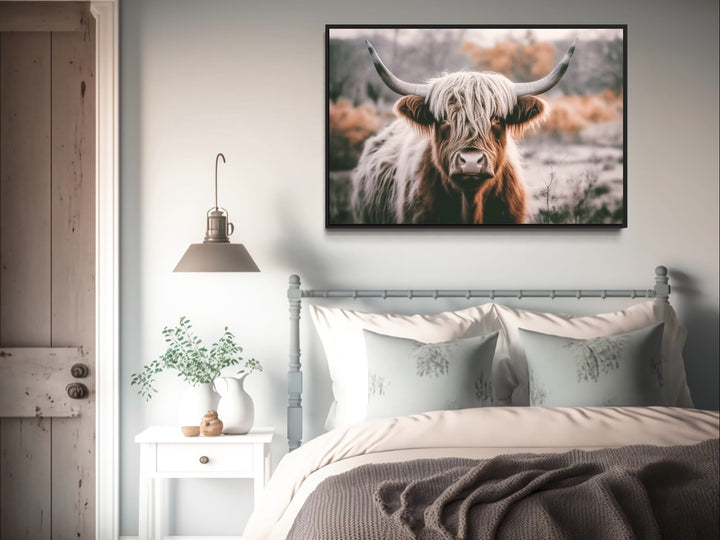 Sepia Highland Cow Photography Wall Art above blue bed