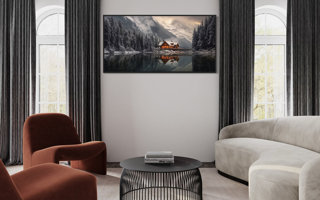 Mountain Cabin In Winter Reflected In Frozen Lake Framed Canvas Wall Art in living room