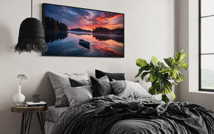 Lake With Boat at Sunset Framed Canvas Wall Art above bed