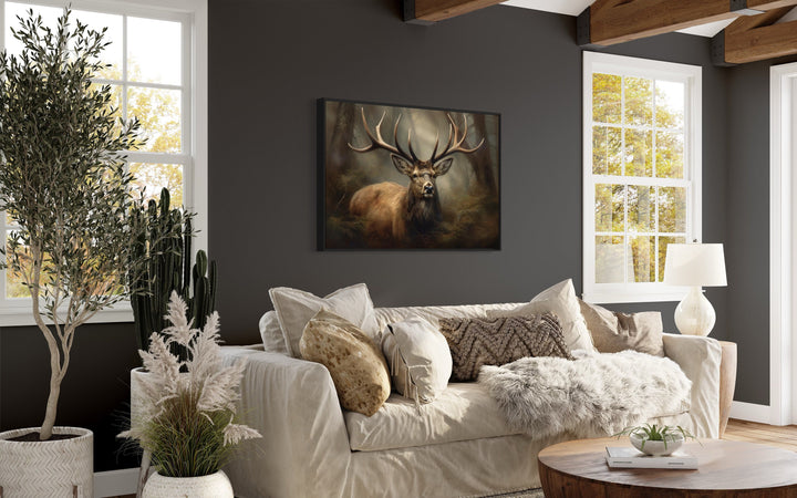 Elk With Big Antlers In The Forest Canvas Wall Art above beige couch