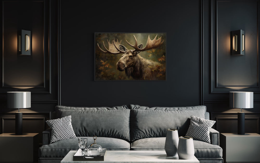Moose With Antlers In The Forest Wall Art in dark room over green couch