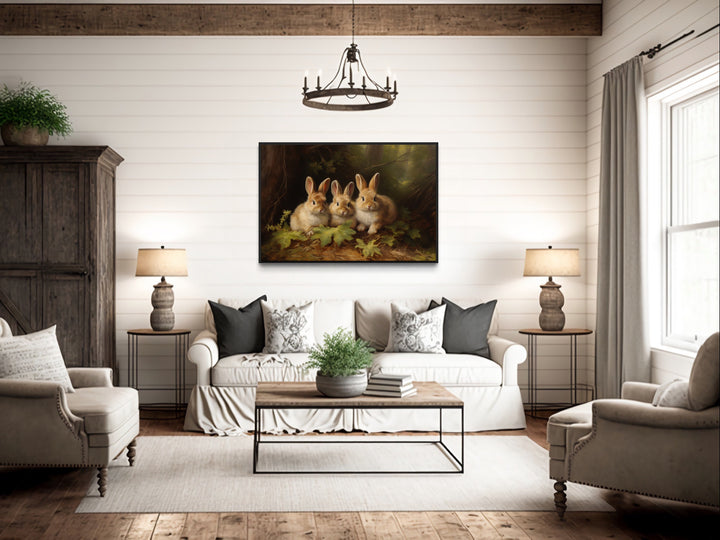 Three Cute Bunnies in The Forest Framed Canvas Wall Art above couch