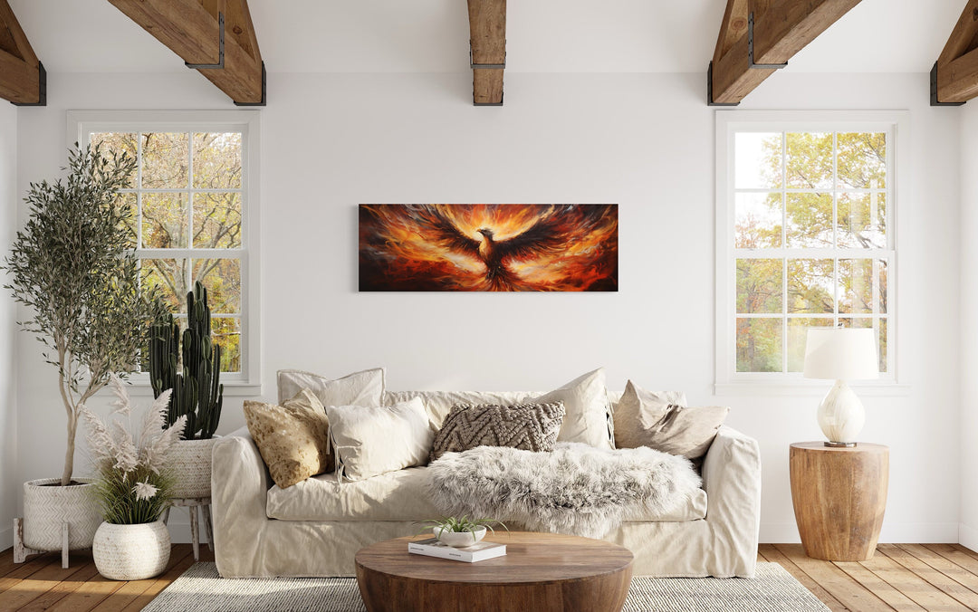 Phoenix Rising From Horizontal Framed Canvas Wall Art above couch