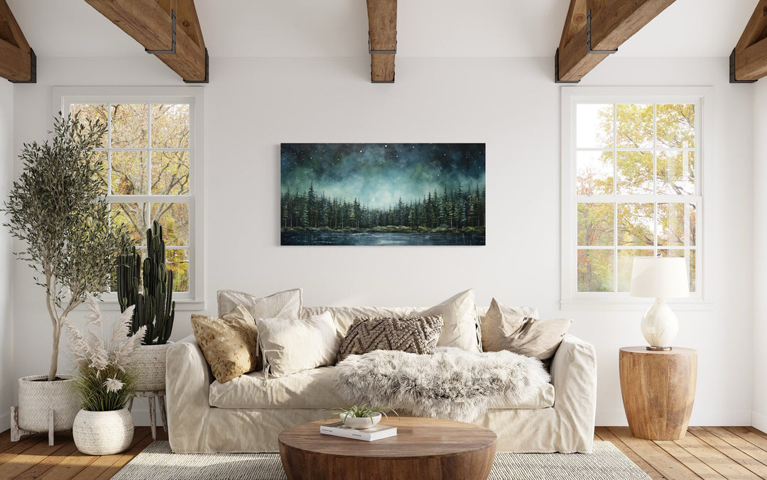 Abstract Starry Sky Over Sage Green Fir Forest And Lake Framed Nature Wall Art above beige couch