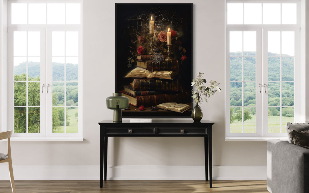 Stack Of Vintage Books With Candles And Spider Web Gothic Framed Canvas Wall Art in living room