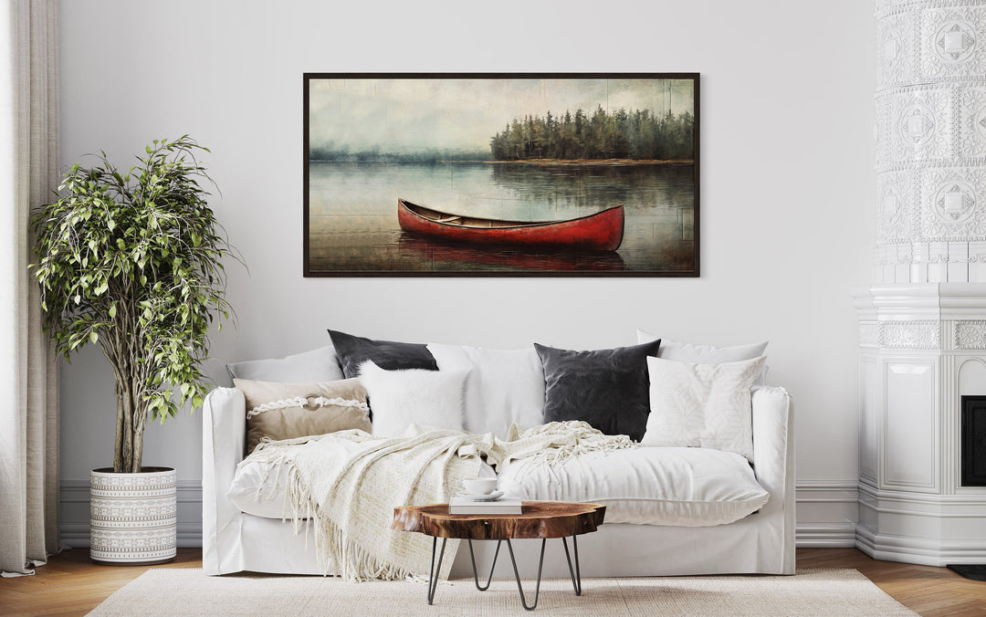 Rustic Red Canoe In The Lake Wall Art "Lake Solitude" over white couch