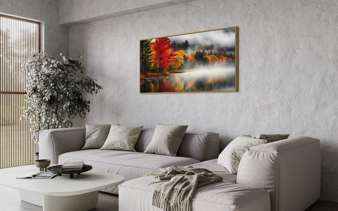 New England Lake And Forest Landscape Autumn Wall Art above grey couch