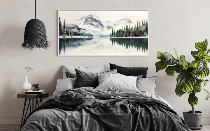 Muted Mountain Lake And Pine Tree Forest Landscape Framed Canvas Wall Art above black bed