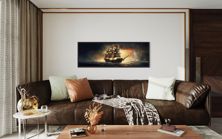 Panoramic Pirate Ship In Ocean Nautical Canvas Wall Art above brown couch