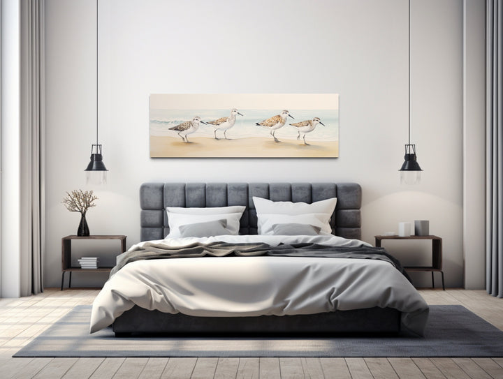 Sandpipers Walking On The Beach Horizontal Framed Canvas Wall Art above bed