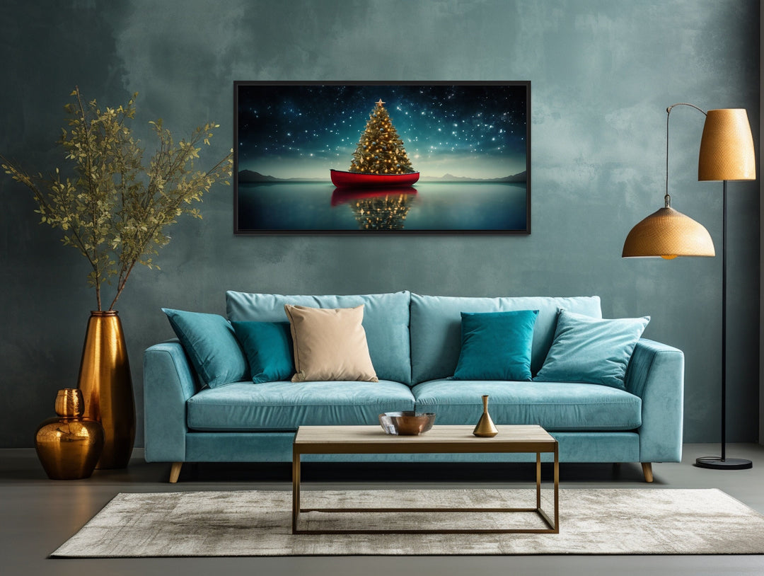 Christmas Tree In Red Canoe Wall Art "Holiday Voyage" over blue couch
