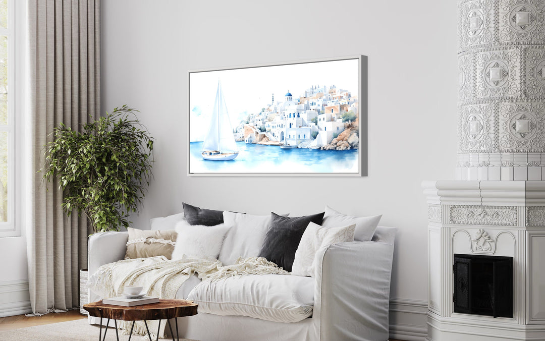 Santorini Sea and Sailboat Framed Canvas Wall Art in living room