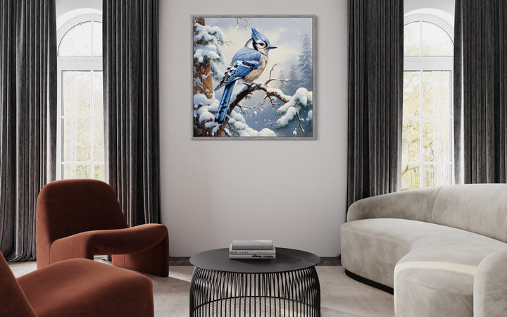 Blue Jay In Snow Winter Framed Canvas Wall Art in living room