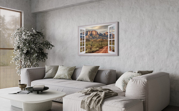 Arizona Desert View From Open Window Wall Art above grey couch