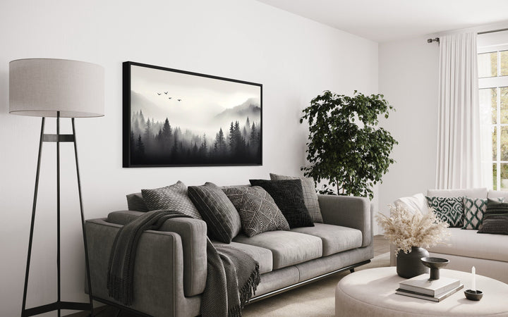 Foggy Forest Black White Minimalist Framed Canvas Wall Art above grey couch