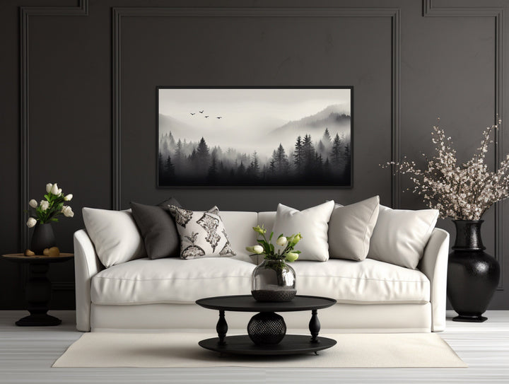 Foggy Forest Black White Minimalist Framed Canvas Wall Art above white couch