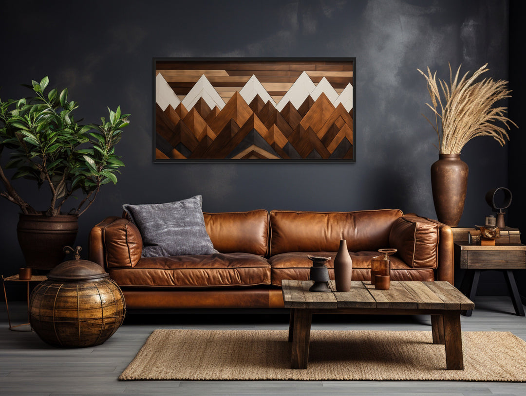 Snow Capped Mountains Layered Wood Panel Effect Canvas Wall Art above brown couch