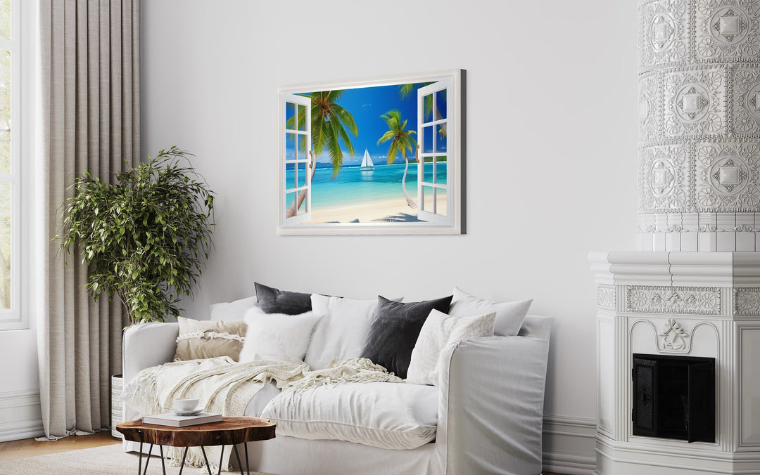 Caribbean Beach And Sail Boat Open Window View Wall Art above white couch