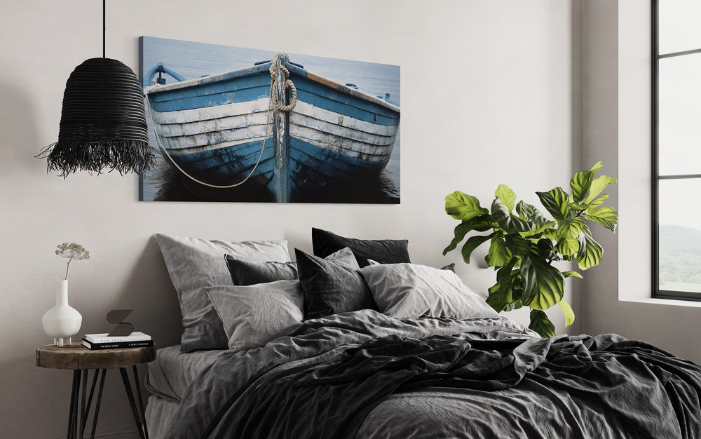 Old Blue White Rustic Boat Nautical Wall Art above black bed