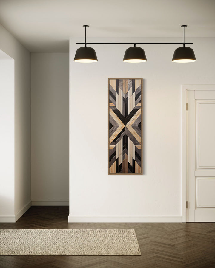 Tall Narrow Neutral Brown Aztec Inspired Vertical Canvas Wall Art hanging on a wall in a room