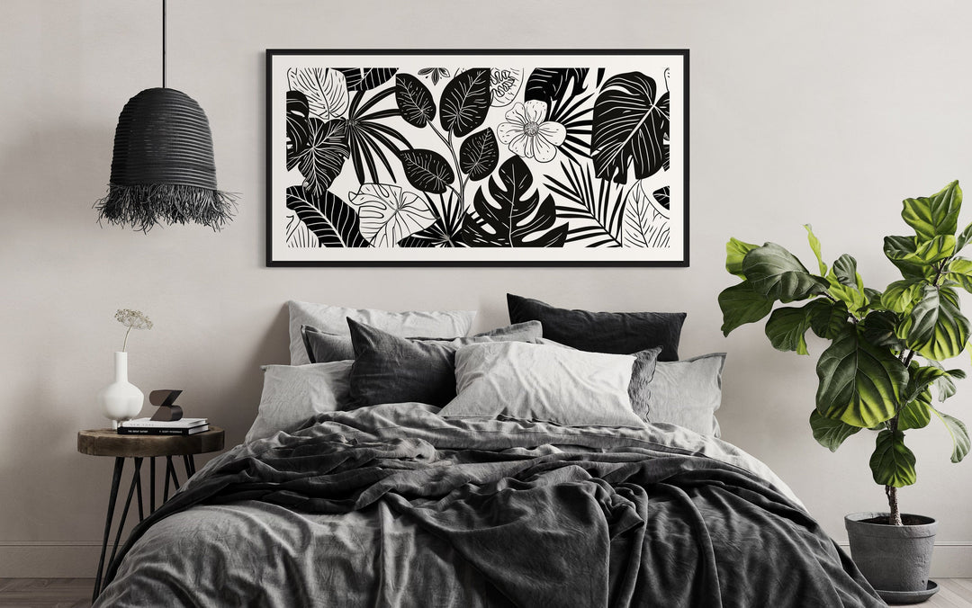 Black White Horizontal Flowers Framed Canvas Wall Art above black bed