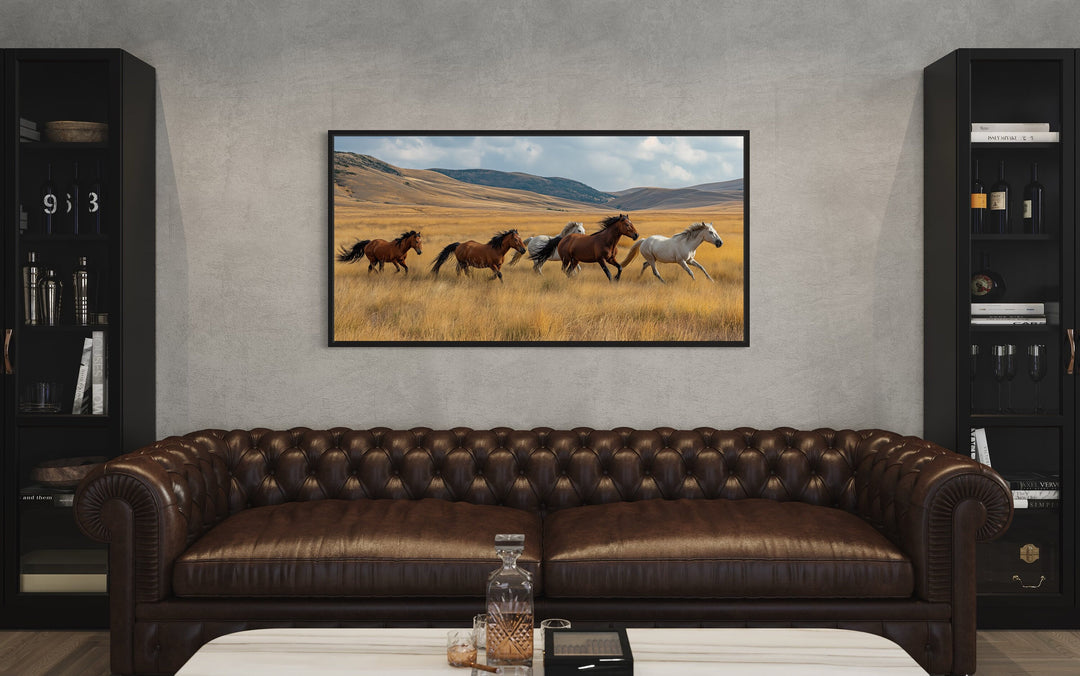 Galloping Wild Horses In Nature Canvas Wall Art above brown couch